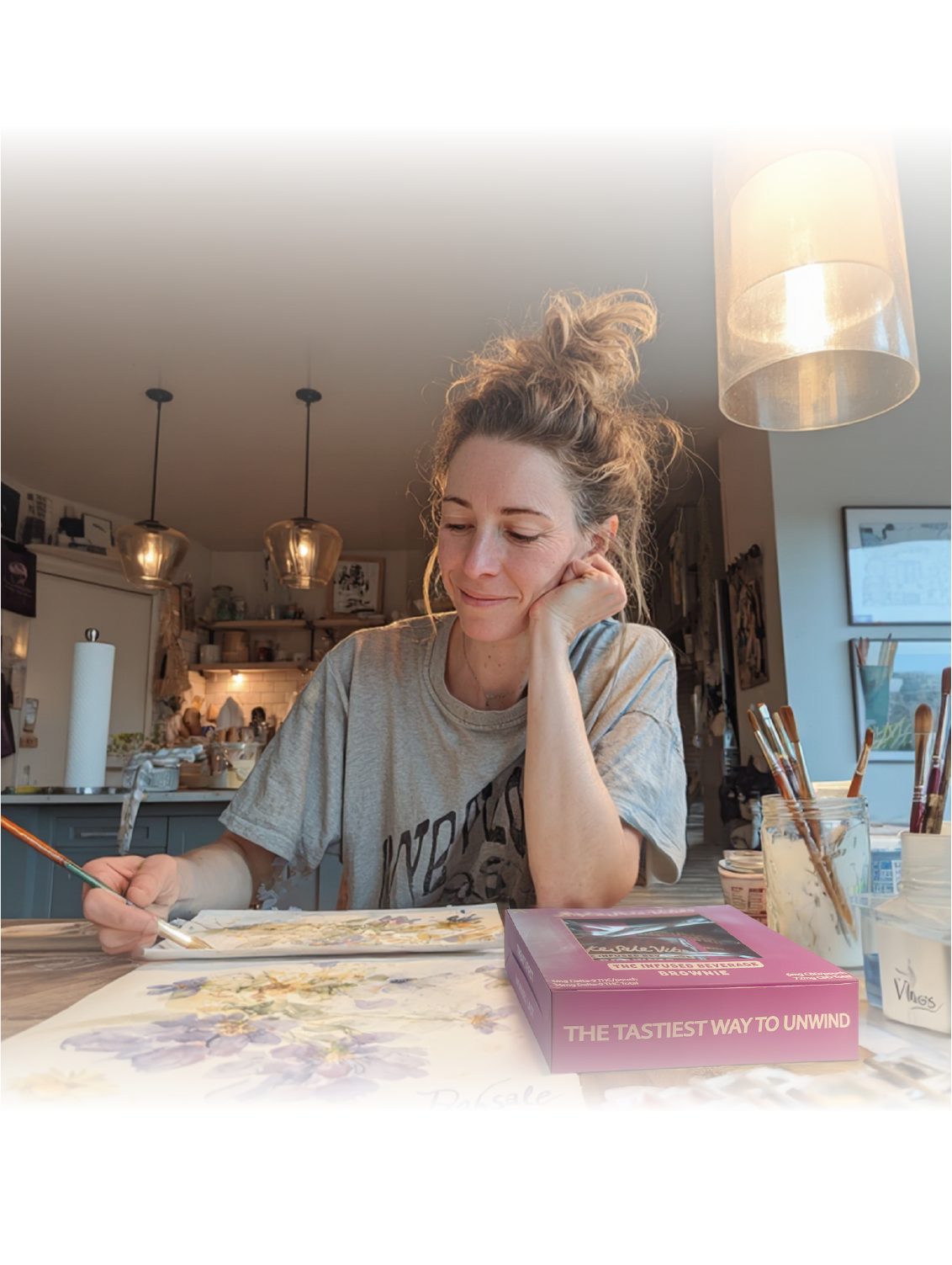 Woman relaxing with art and product